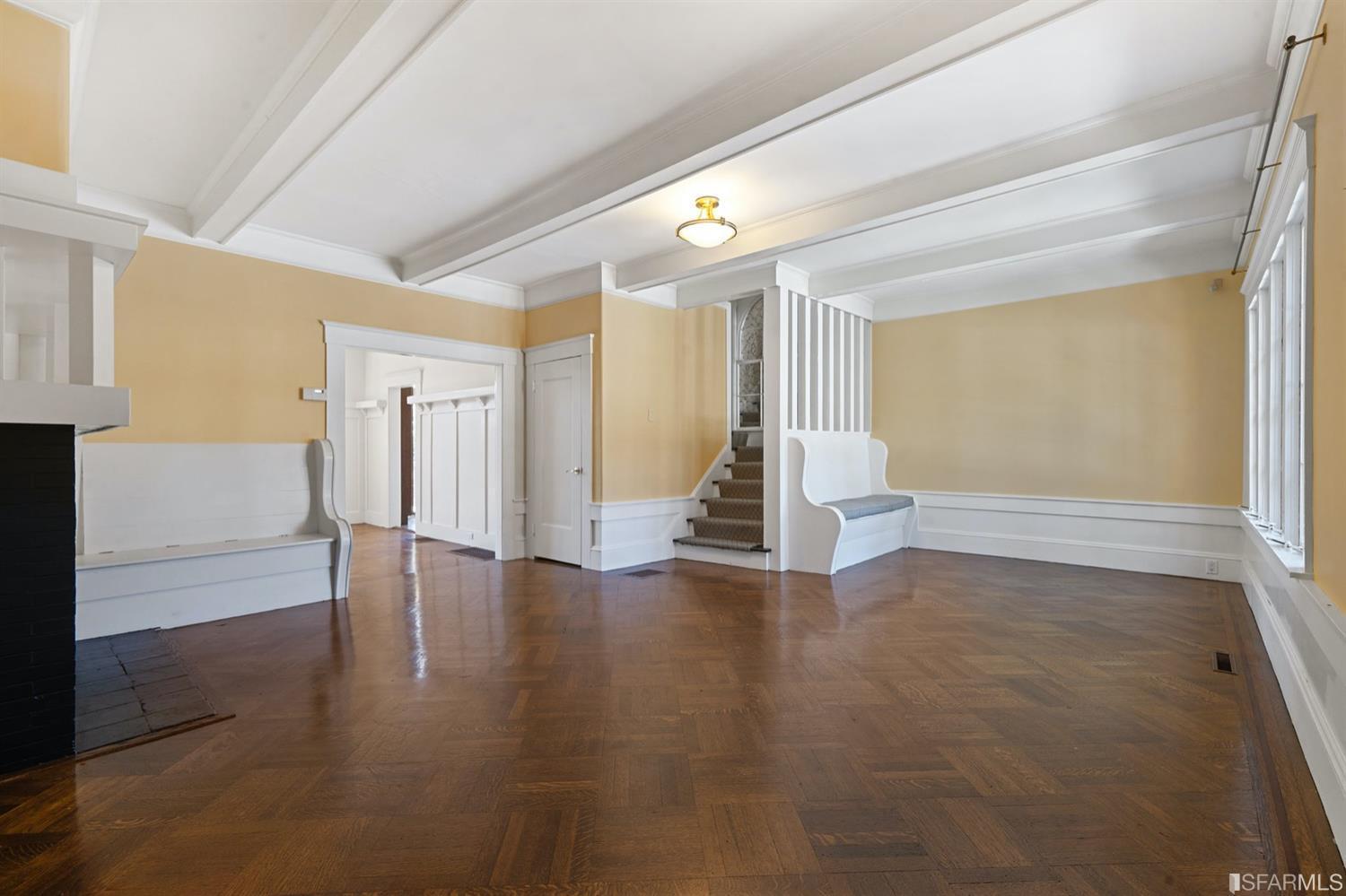 Empty room with wood floors