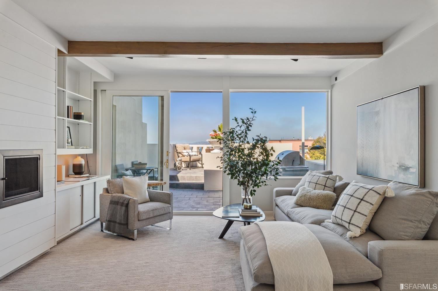 living room opening to back patio