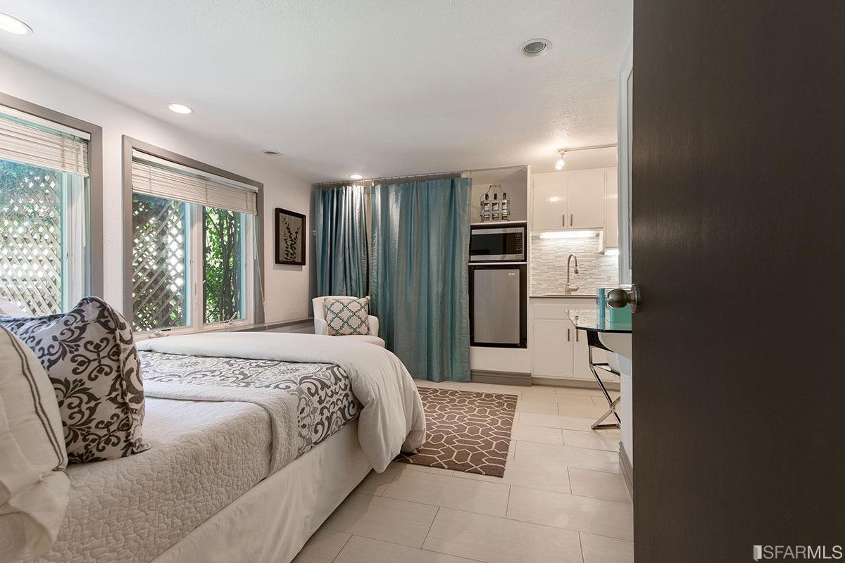 bedroom with blue curtain