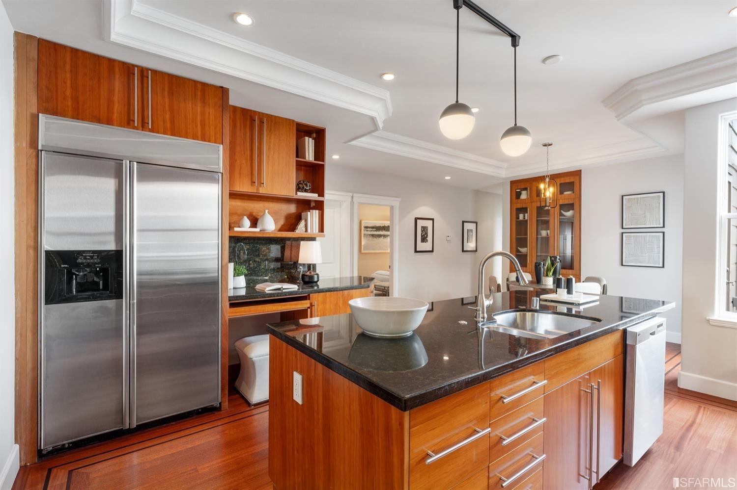 217-219 16th Avenue Another view of kitchen including fridge and butcher block.