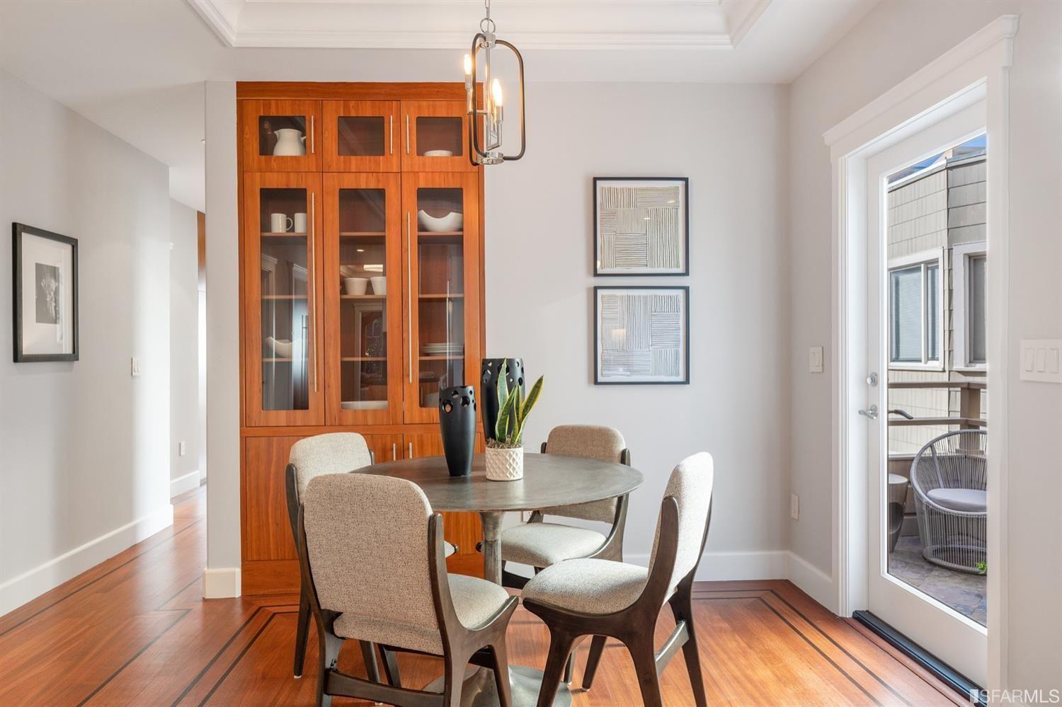 217-219 16th Avenue Quaint dining room, round table set for four.