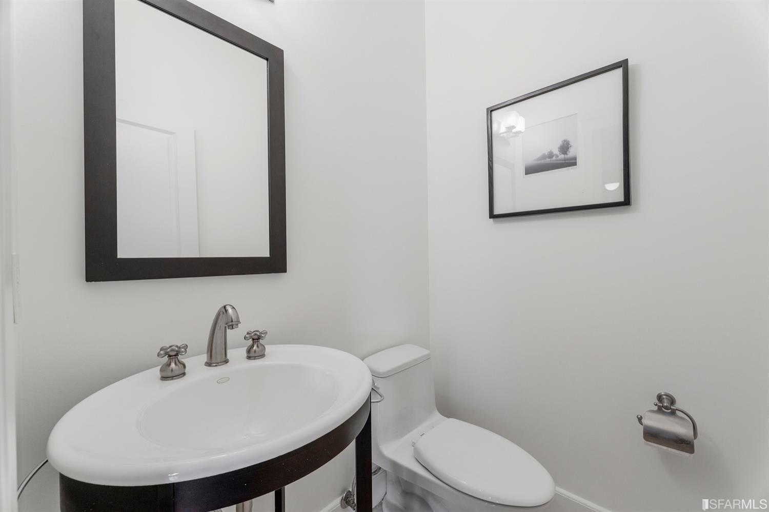 217-219 16th Avenue Half bath with mirror. 