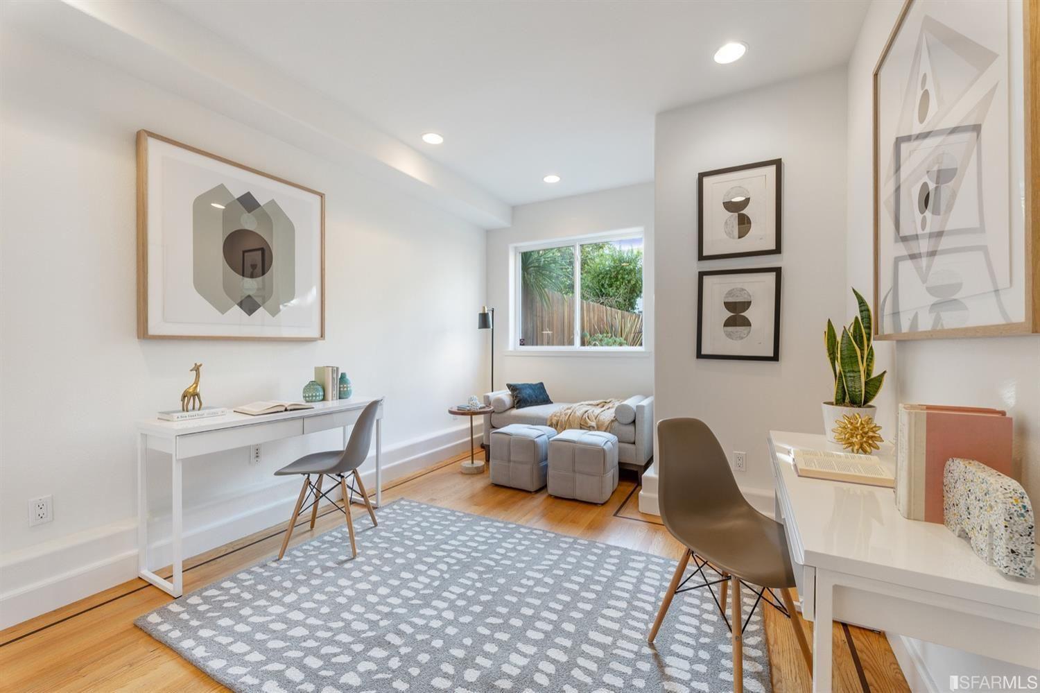 217-219 16th Avenue Minimalistic office space with modern greyscale art. 