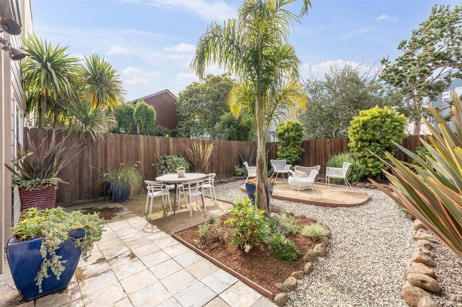 217-219 16th Avenue Backyard with fire pit, and casual dining areas. 