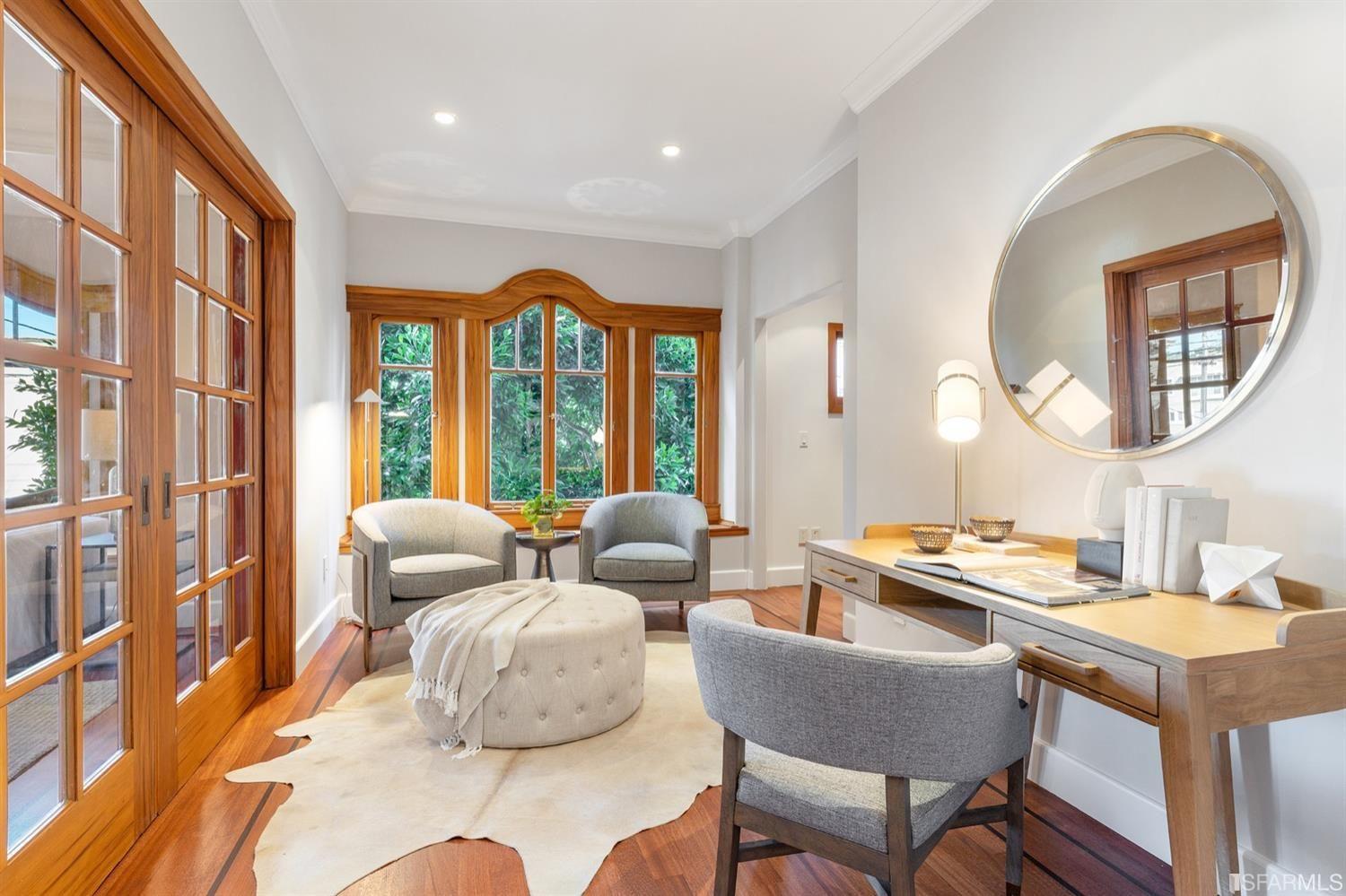 217-219 16th Avenue Study, casual room with animal hide floor covering. 